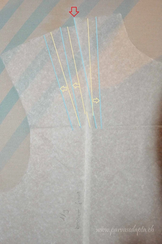 light lines =old dart position, blue lines= new dart position, red arrow shows you the dart I cut and let overlap while adjusting the pattern to my size. You see that the dart is not distorted though the fold is running through it.